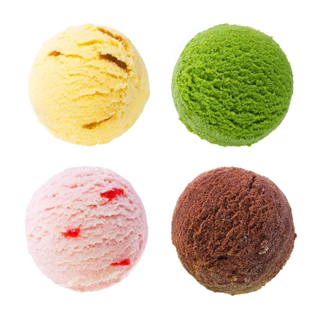 Close-up of multi colored ice cream scoops over white background
