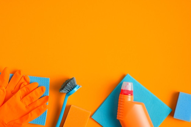 Close-up of multi colored pencils against orange background