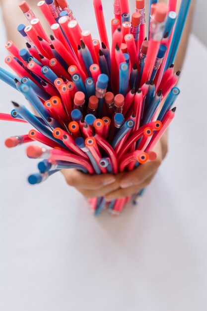 Close-up of multi colored pencils on table