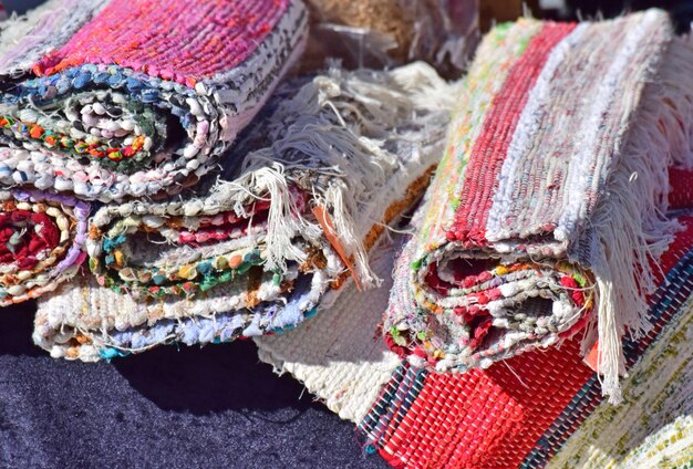 Close-up of multi colored rug for sale