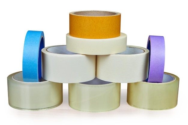 Photo close-up of multi colored tapes against white background