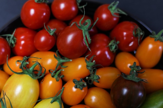 a close up of multicolored tomatoes