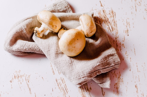 Close-up of mushrooms on a linen cloth