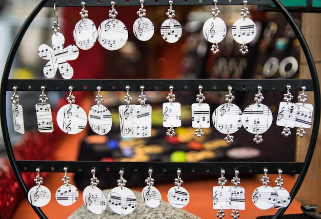 Close-up of music note decorations hanging on display at store