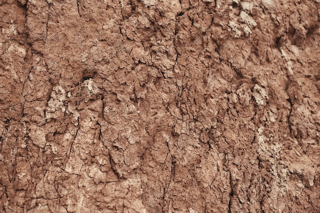 Close up of natural brown stone mountain texture and background