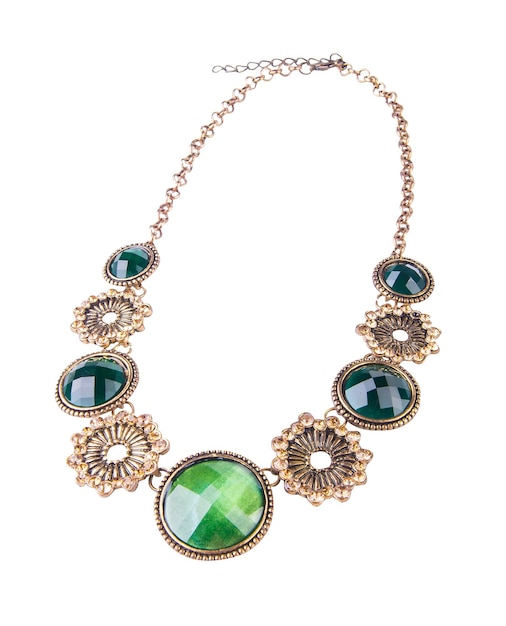 close-up of necklace against white background