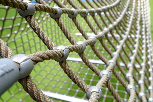 Photo close up net rope on playground