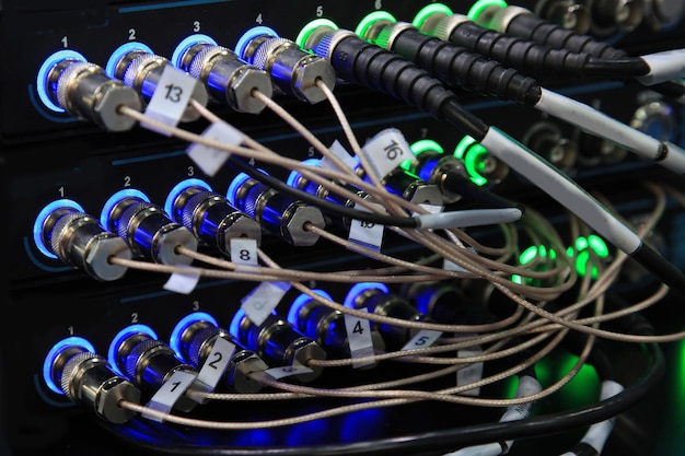 close up of network hub and cables with backlight