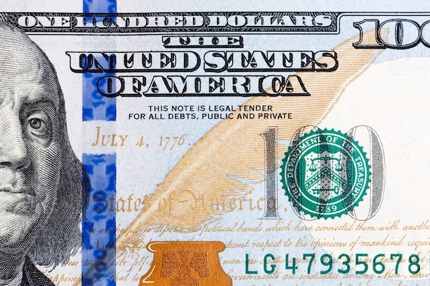 Close up of new hundred dollar bill. High quality texture on macro.