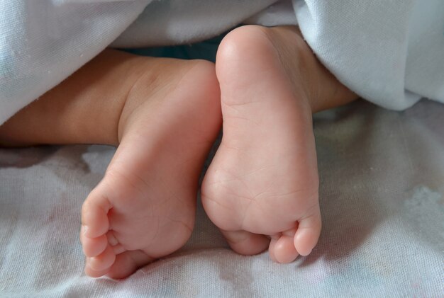 close up of newborn feet