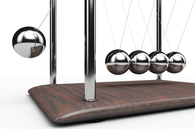 Close up of newton's cradle in action.