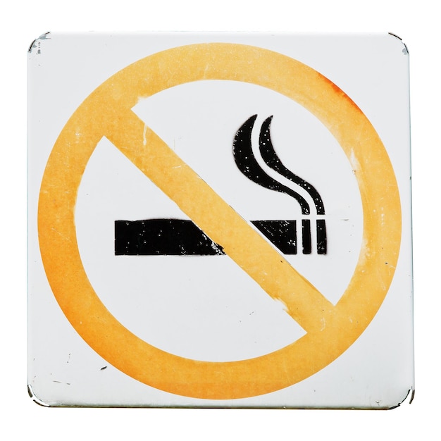 Photo close-up of no smoking sign on white background