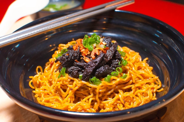 Close-up of noodles in bowl on table