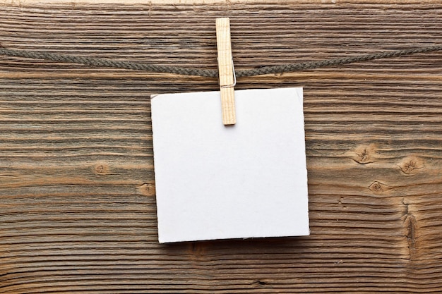 Close up of a note and a clothes peg