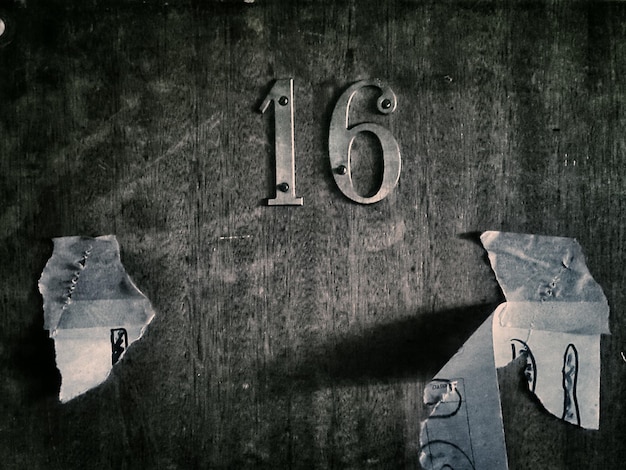 Close-up of number on door