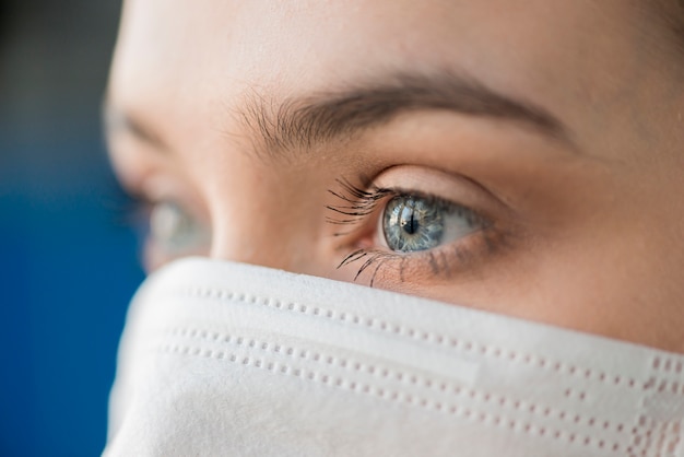 Close-up nurse wearing mask