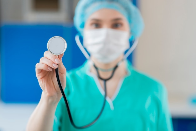 Close-up nurse with stethoscope