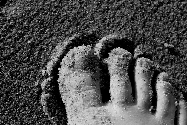 Фото Близкий план ноги на песке