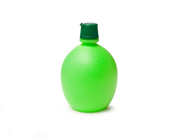 Фото Близкий план зеленой бутылки на белом фоне