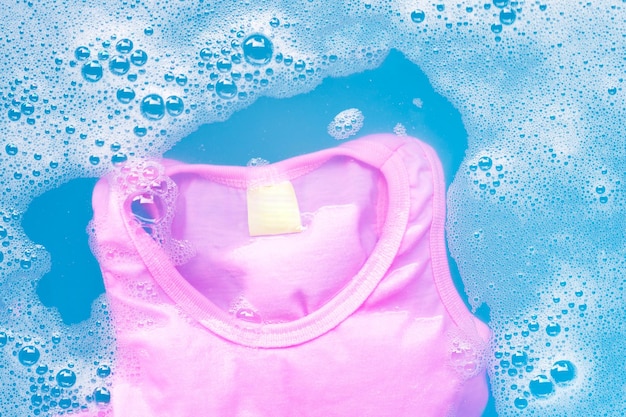 Фото Клоуз-ап розовой ткани в ведрах