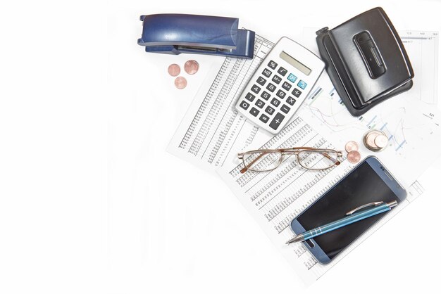 Photo close-up of office supplies over white background