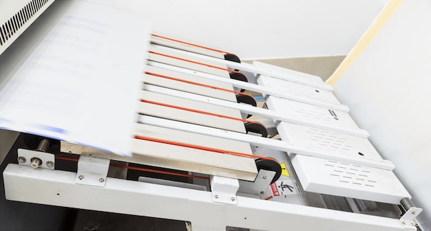 Close up of an offset printing machine during production