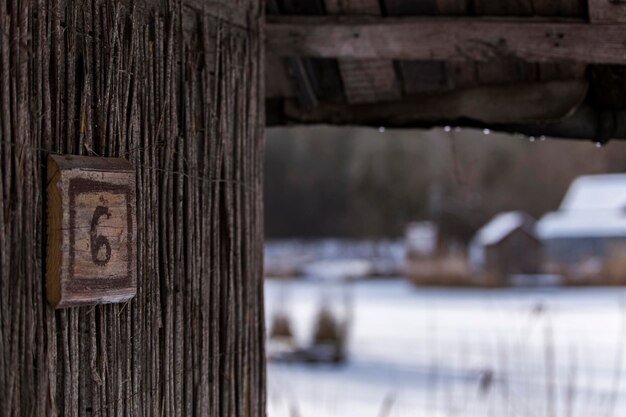 Close-up of old building during winter