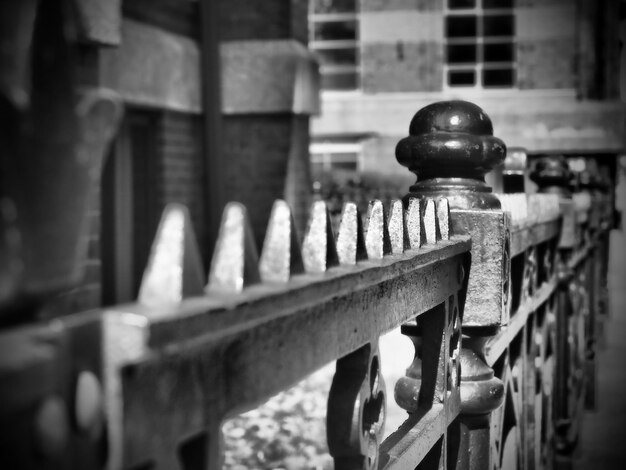 Close-up of old metal fence