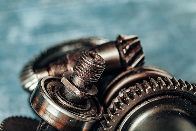 Close up of old rusty car parts on dark 