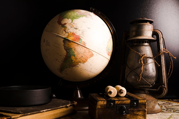 Close-up of old vintage globe and lantern