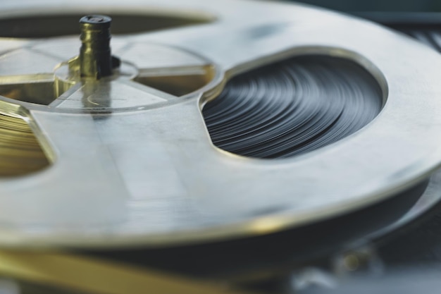 Photo close up old vintage reel tape recorder background