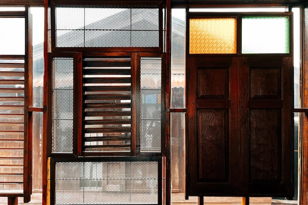 Close up of old vintage style and antique wooden window in Thailand