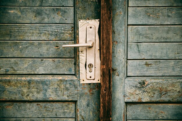 Photo close-up of old wooden door