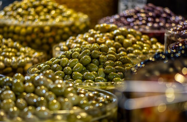 Close-up of olives at market stall