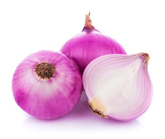 Close-up of onions on white background