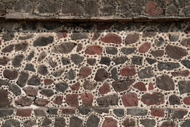 Foto close-up op de stenen muur van de azteekse piramide