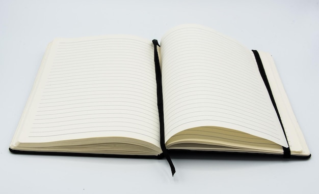 close-up of open book against white background