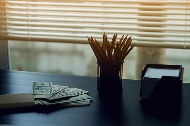 Close-up of open book on table at home