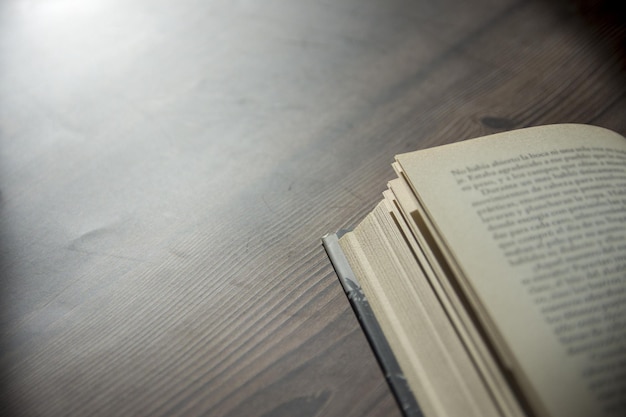 Close up of open book on table