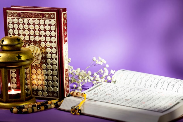 Photo close up open quran with purple background