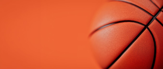 Foto close-up opname van oranje basketbal op oranje achtergrond