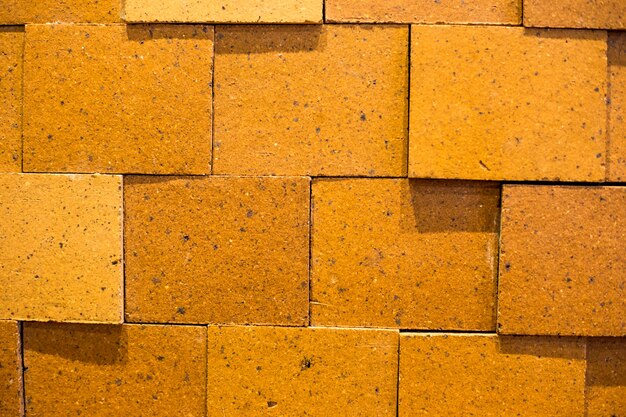 close up of orange brick wall.