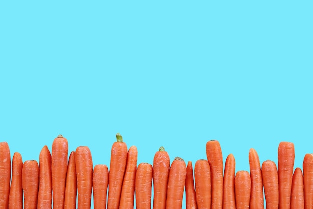 Photo close-up of orange colored against blue background