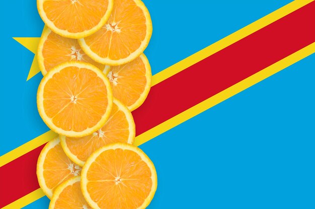 Close-up of orange fruit against blue background