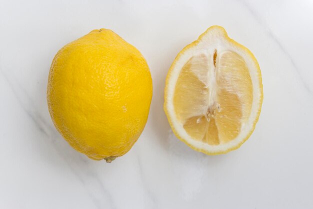 Close-up of orange fruit against white background