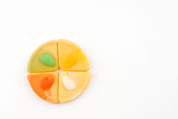 Photo close-up of orange fruit against white background