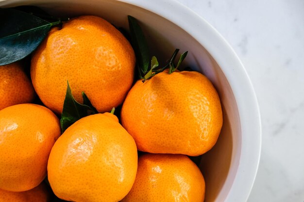 Close-up of orange fruit in container