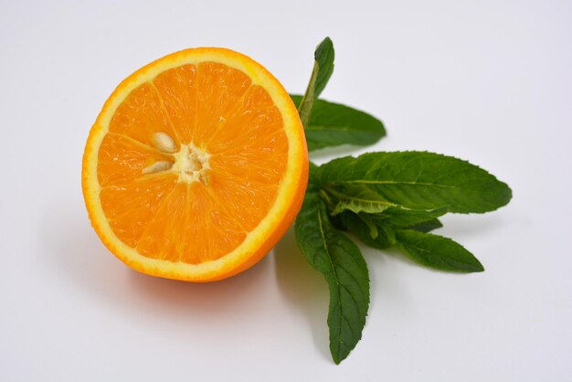 Close-up of orange fruit on white background