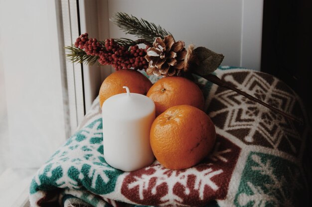 Close-up of orange fruits on table at home