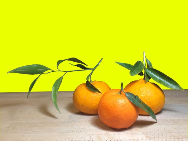 Close-up of orange fruits on table